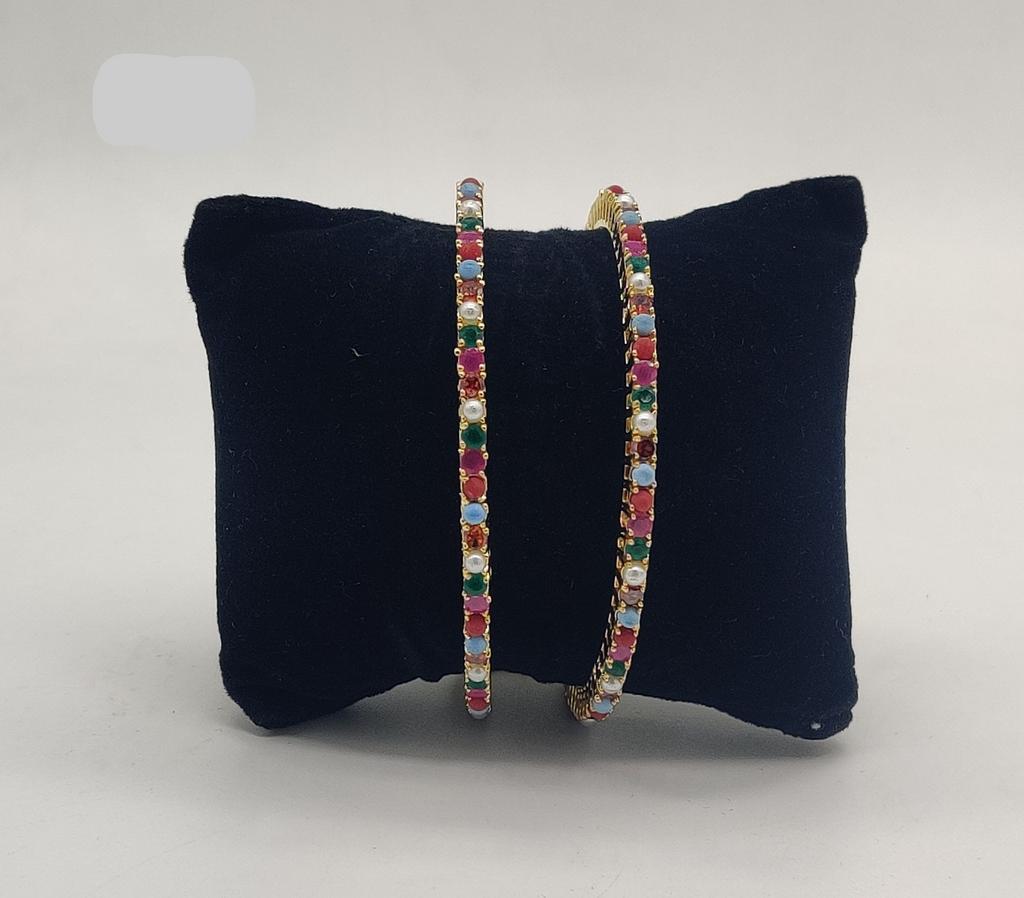Navaratna gold tone gemstone pearl bangles with multicolour stones traditional jewellery