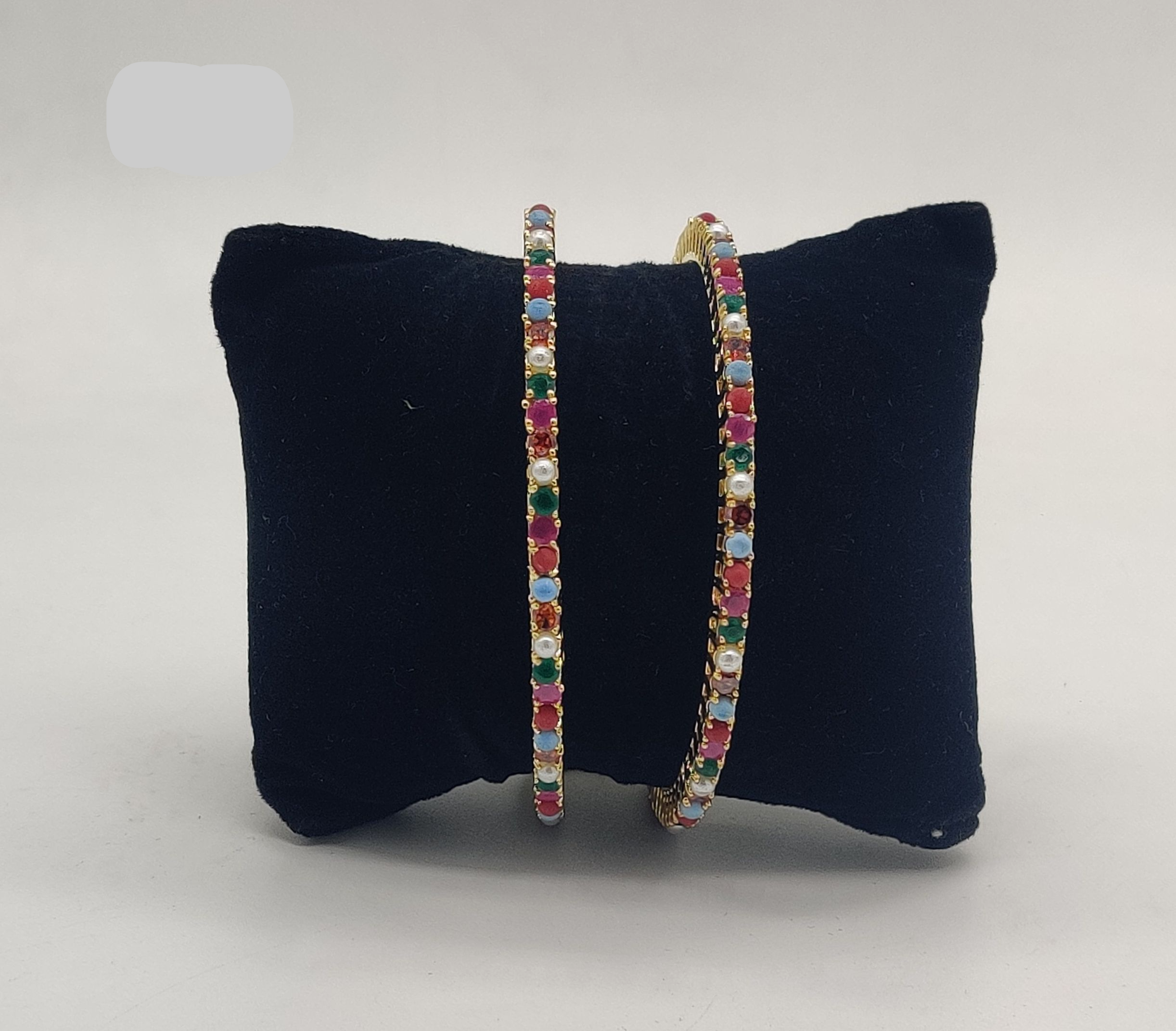 Navaratna gold tone gemstone pearl bangles with multicolour stones traditional jewellery