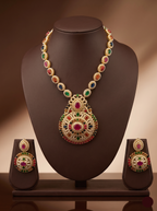 Navaratna multicolour stone necklace set with traditional gold-tone design and matching stud earrings.