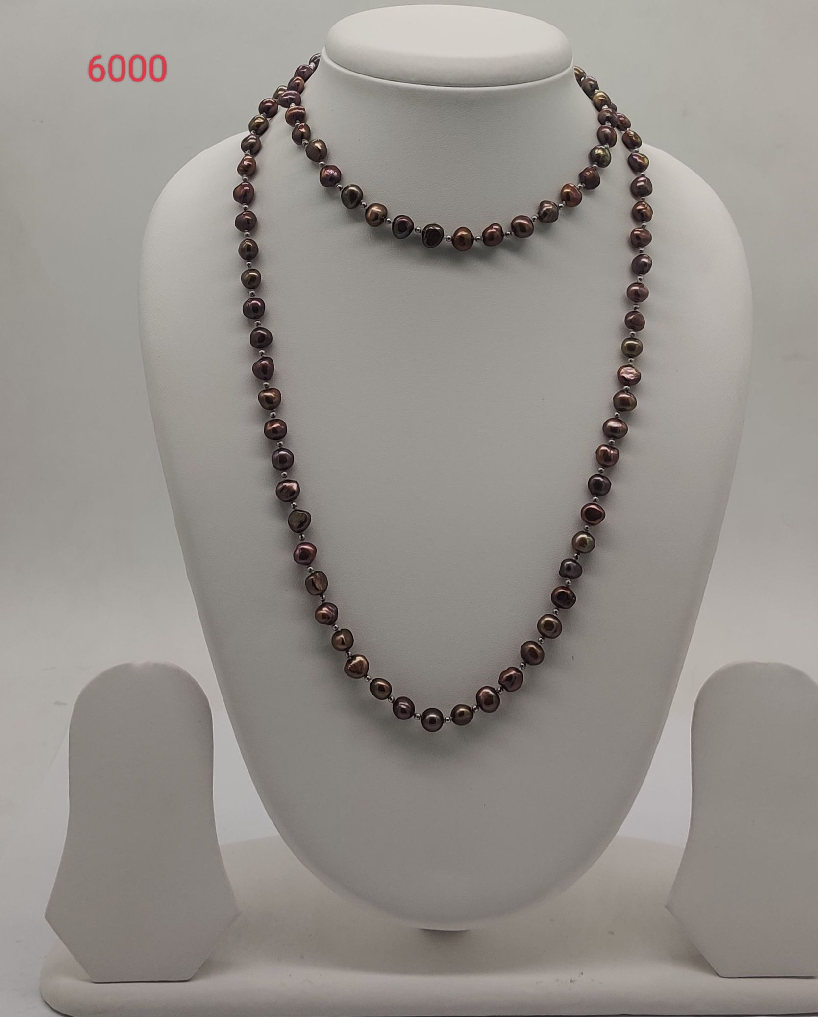 Noir Glow freshwater pearl necklace with black and peacock green pearls in single strand design