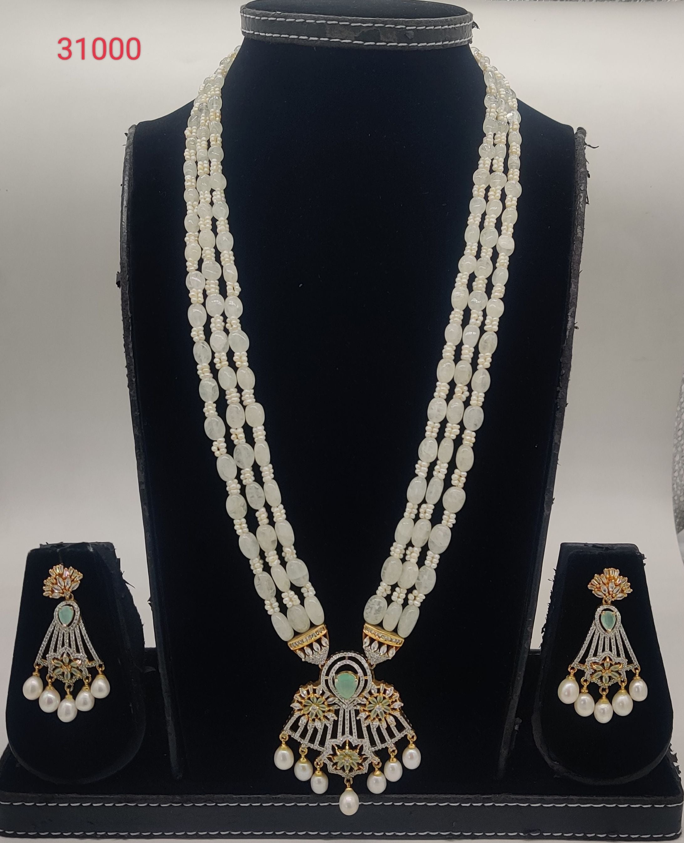 Regal Bloom multi-strand white freshwater pearl pendent set with light green gemstone pendant and dangling pearl earrings