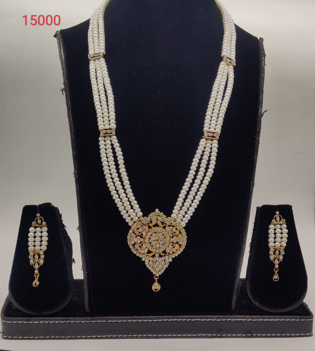 Celestial Charm three-line flat white pearl pendent set with clear stone pendant and matching earrings