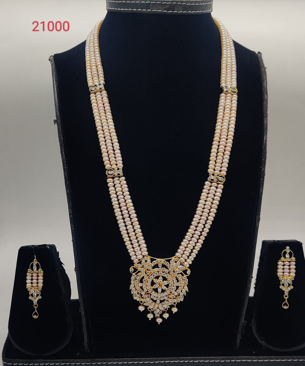 Bloom Regal three-line light pink pearl pendent set with floral white stone pendant and matching earrings