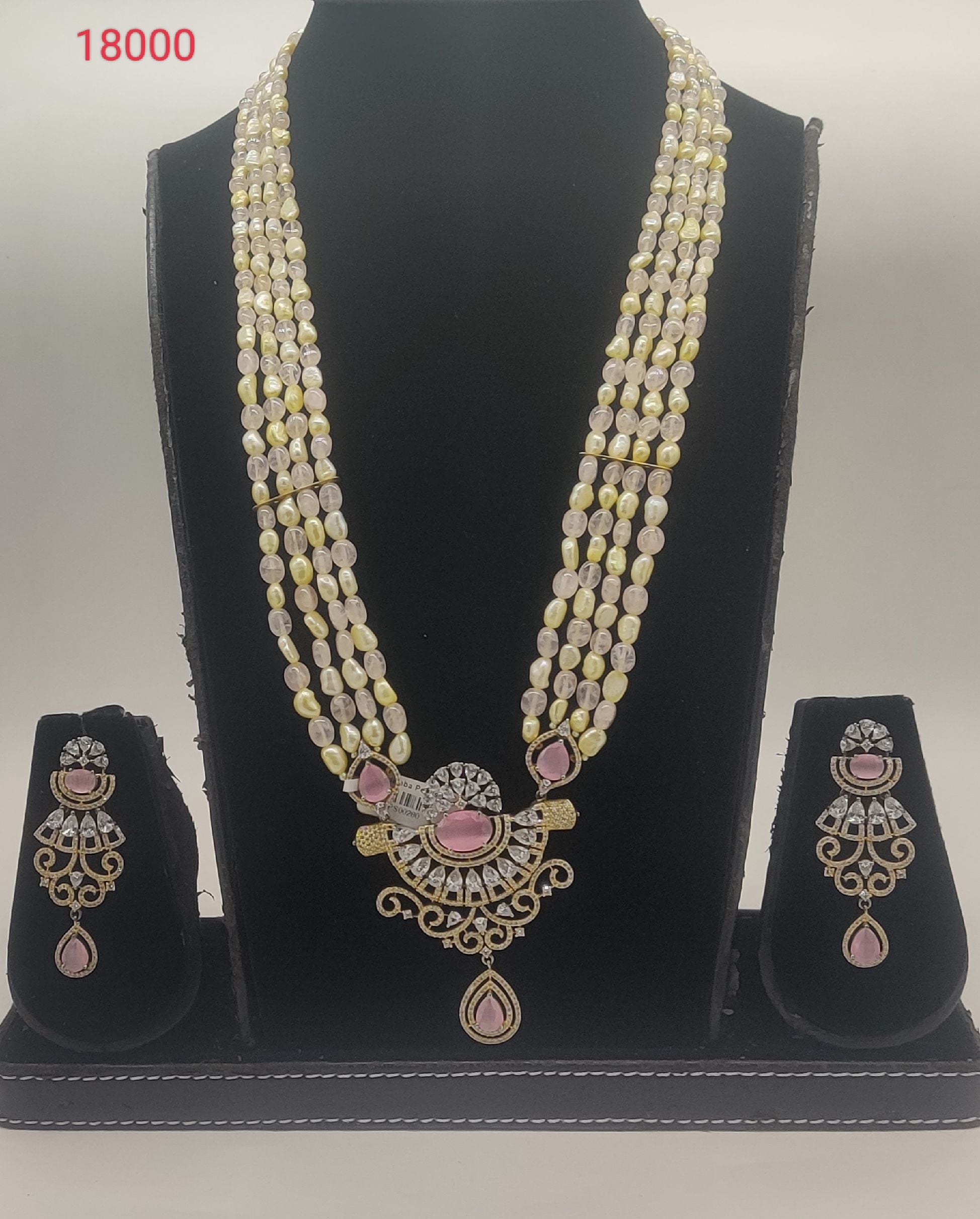 Rosy Radiance Royal freshwater pearl multi-strand pendent set with pink gemstones and matching dangle earrings