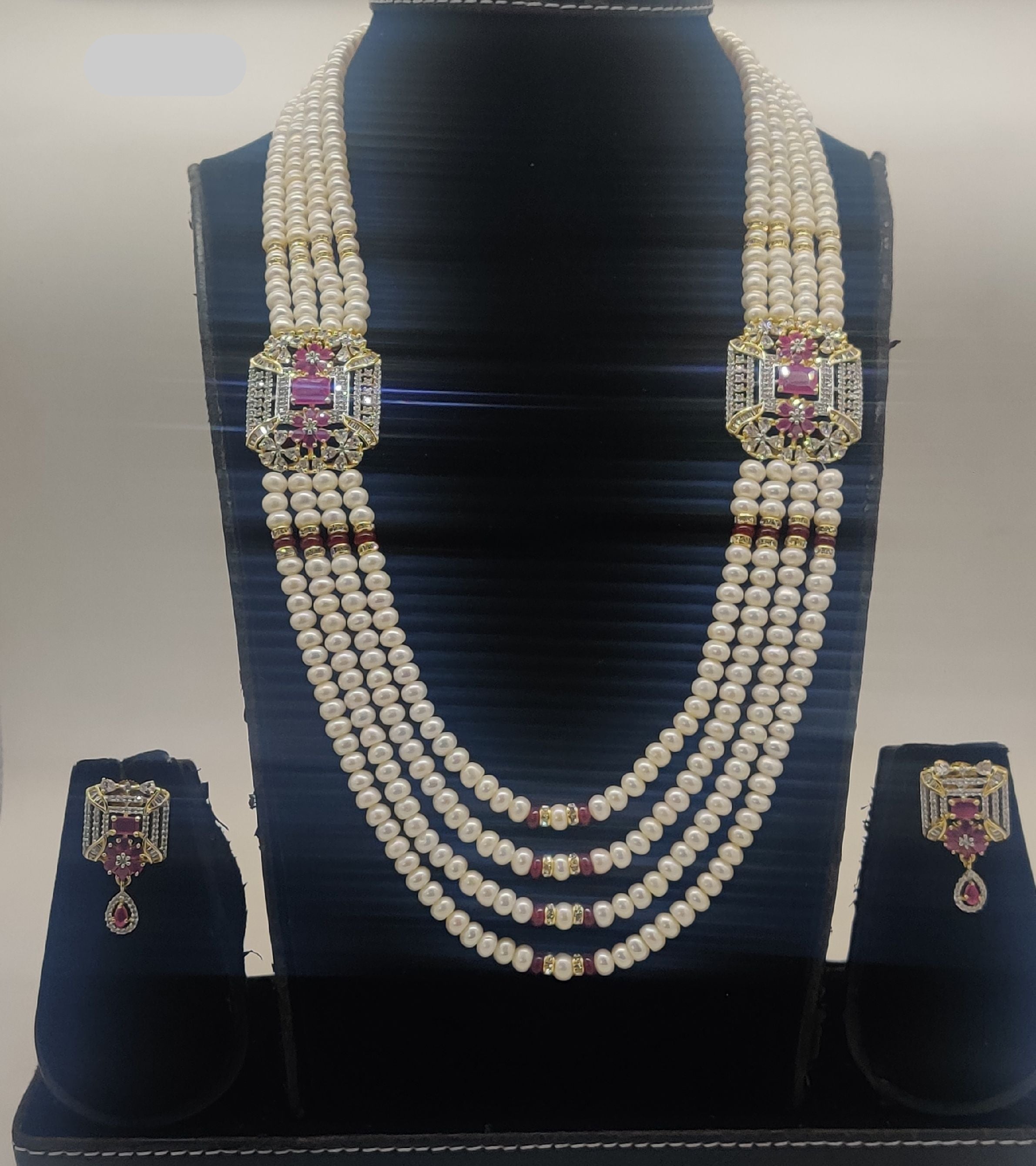 Four-line freshwater pearl broach set with dual rectangular pink and white gemstone pendants and matching drop earrings