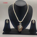 pearl necklace with pendant and matching earrings set