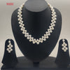 Floral grace double-strand freshwater pearl necklace set with graduated white pearls and matching drop earrings