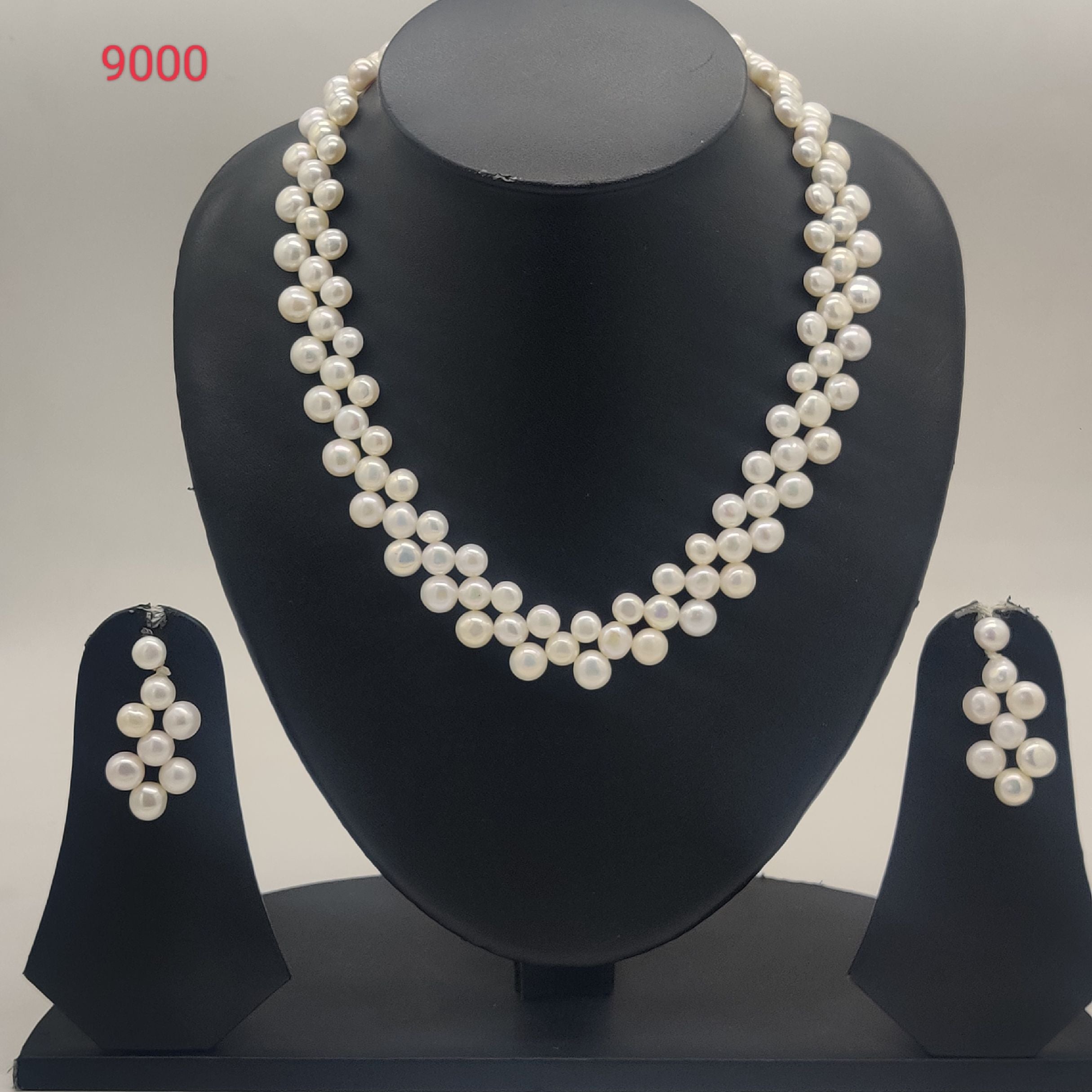 Floral grace double-strand freshwater pearl necklace set with graduated white pearls and matching drop earrings