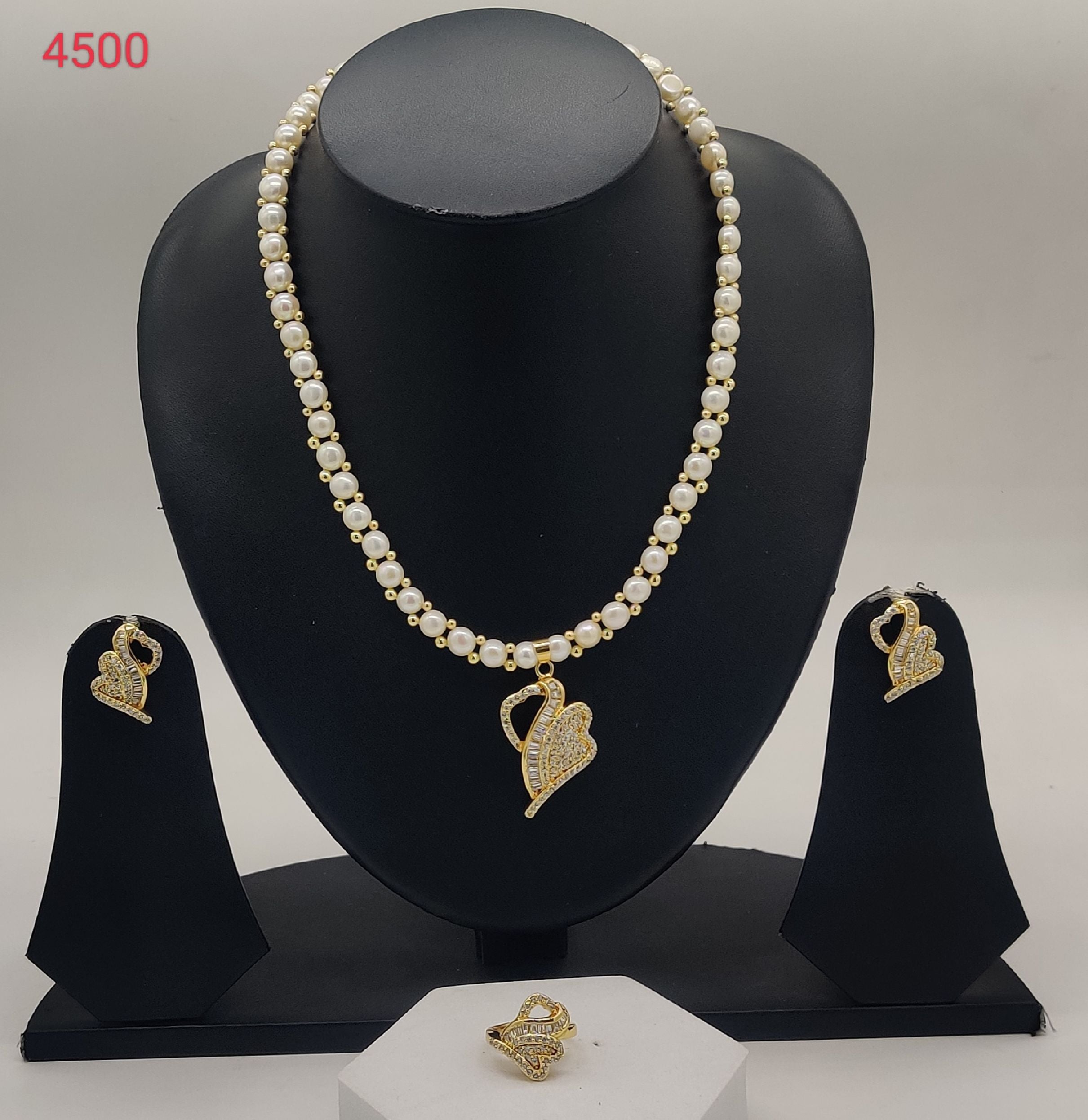 Leaf Sparkle freshwater pearls pendant set with gold-toned leaf pendant and matching stud earrings for women