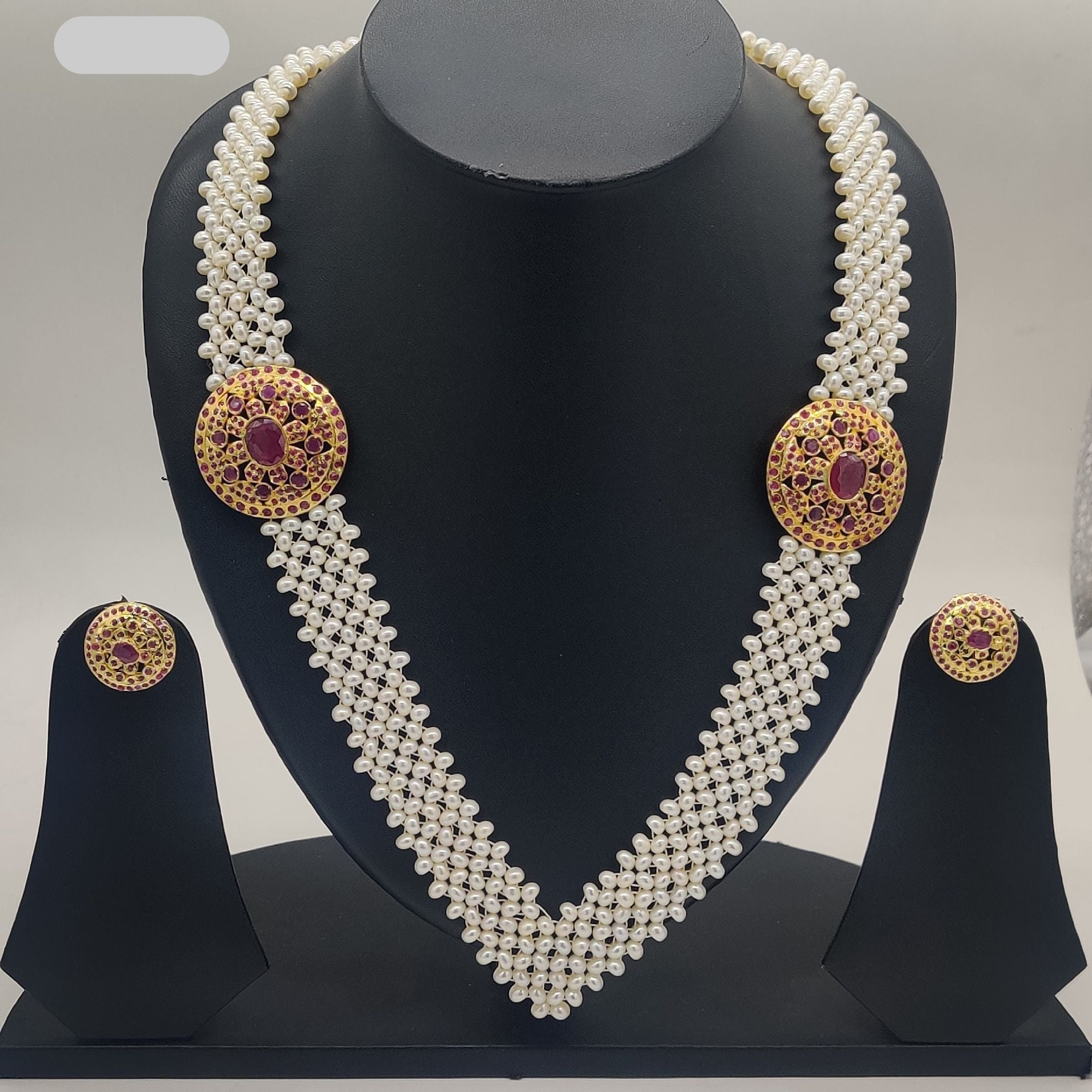 Long Freshwater Pearl Broach Set with Twin Circular Red Gemstone Motifs and Matching Earrings