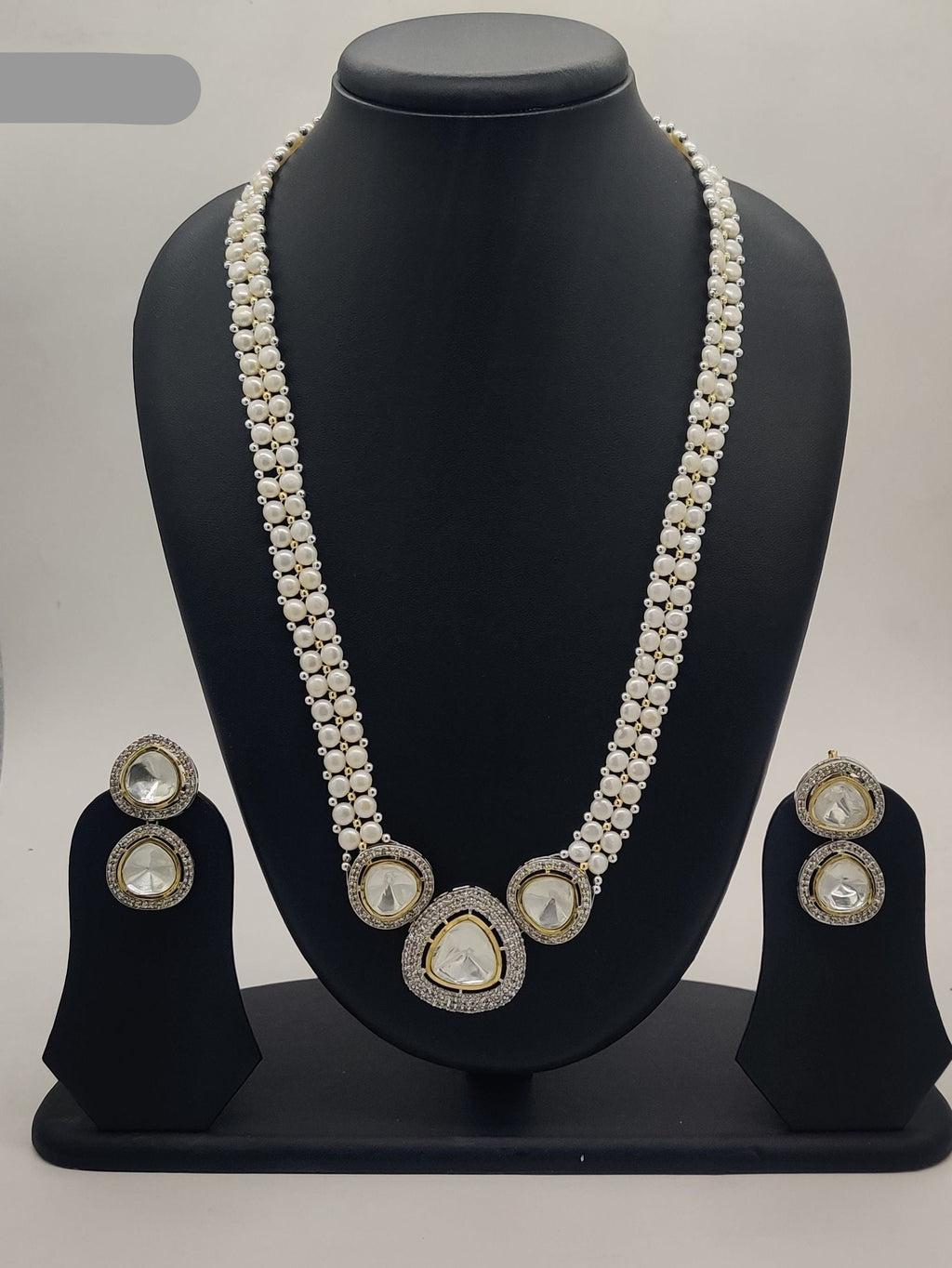Royal Polki Layers long freshwater pearl necklace set with multi polki pendants and matching earrings