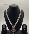 Rose Blush two-line oval freshwater pearl pendent set with white and pink pearls and pink gemstone pendant earrings