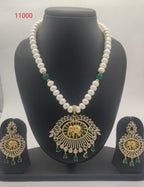 Emerald Majesty genuine freshwater pearl necklace and earrings set with emerald green stones and gold toned pendant for women