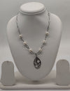 Abstract Pearl Medallion Silver Necklace
