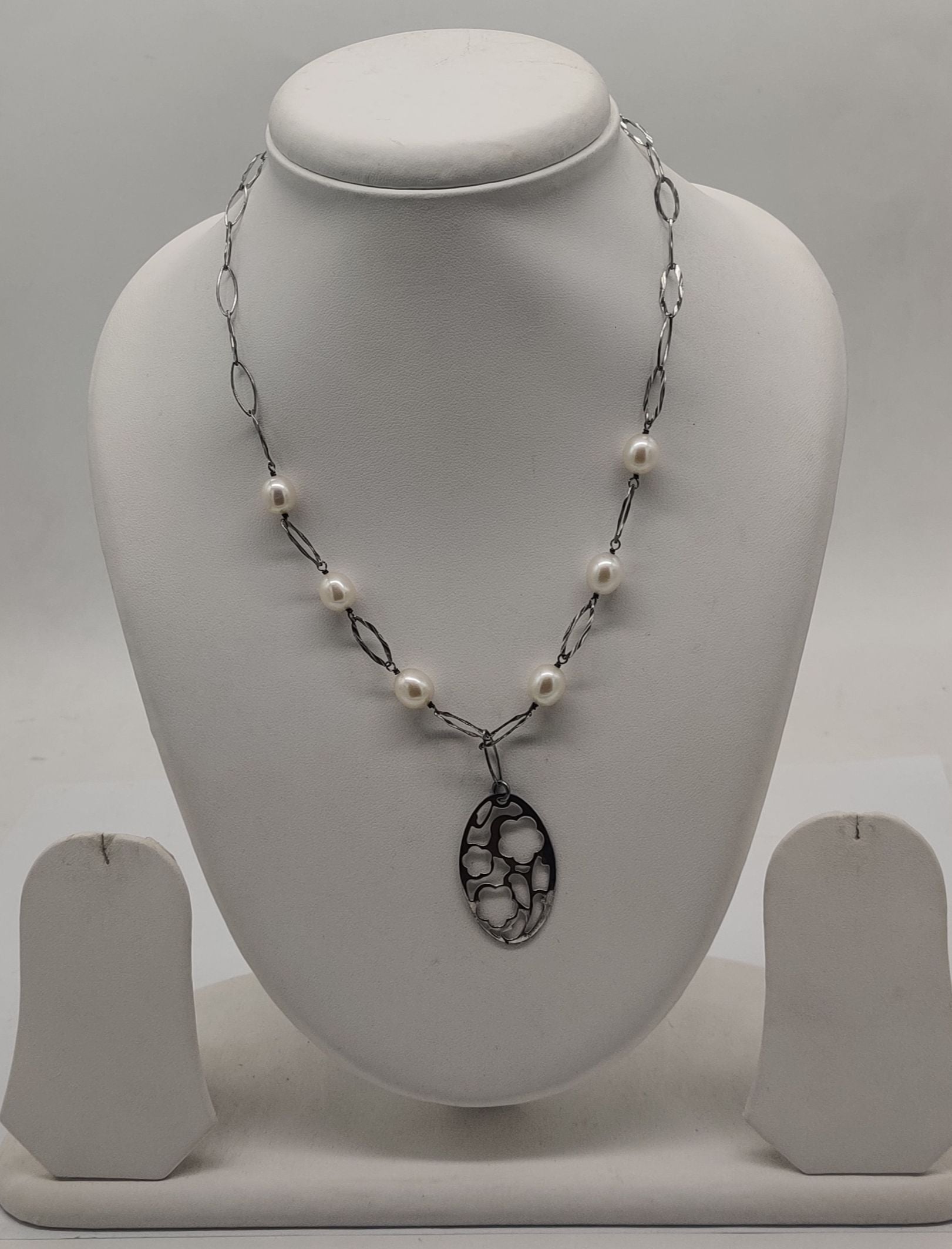 Abstract Pearl Medallion Silver Necklace