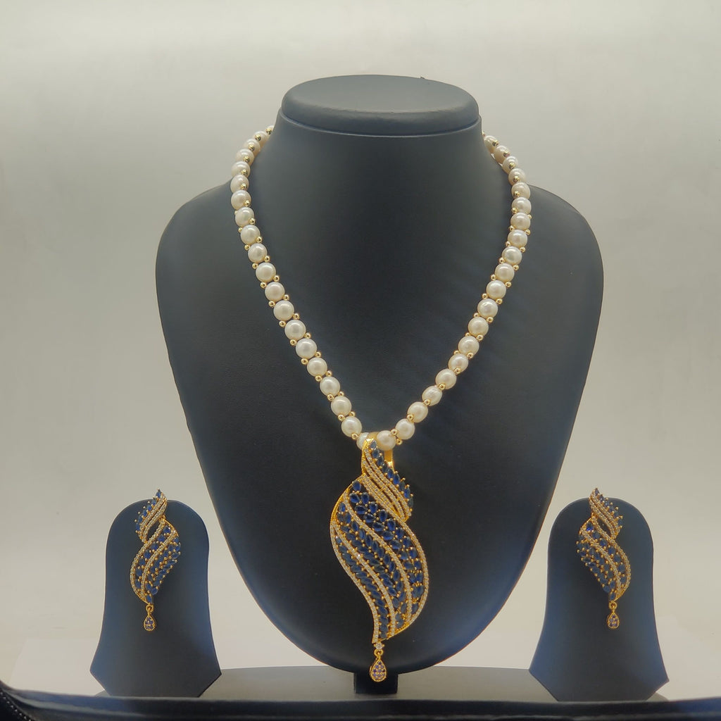 Ocean Leaf freshwater pearls pendant set with blue and white stones and matching earrings for women