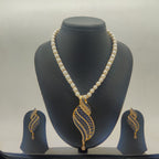 Ocean Leaf freshwater pearls pendant set with blue and white stones and matching earrings for women