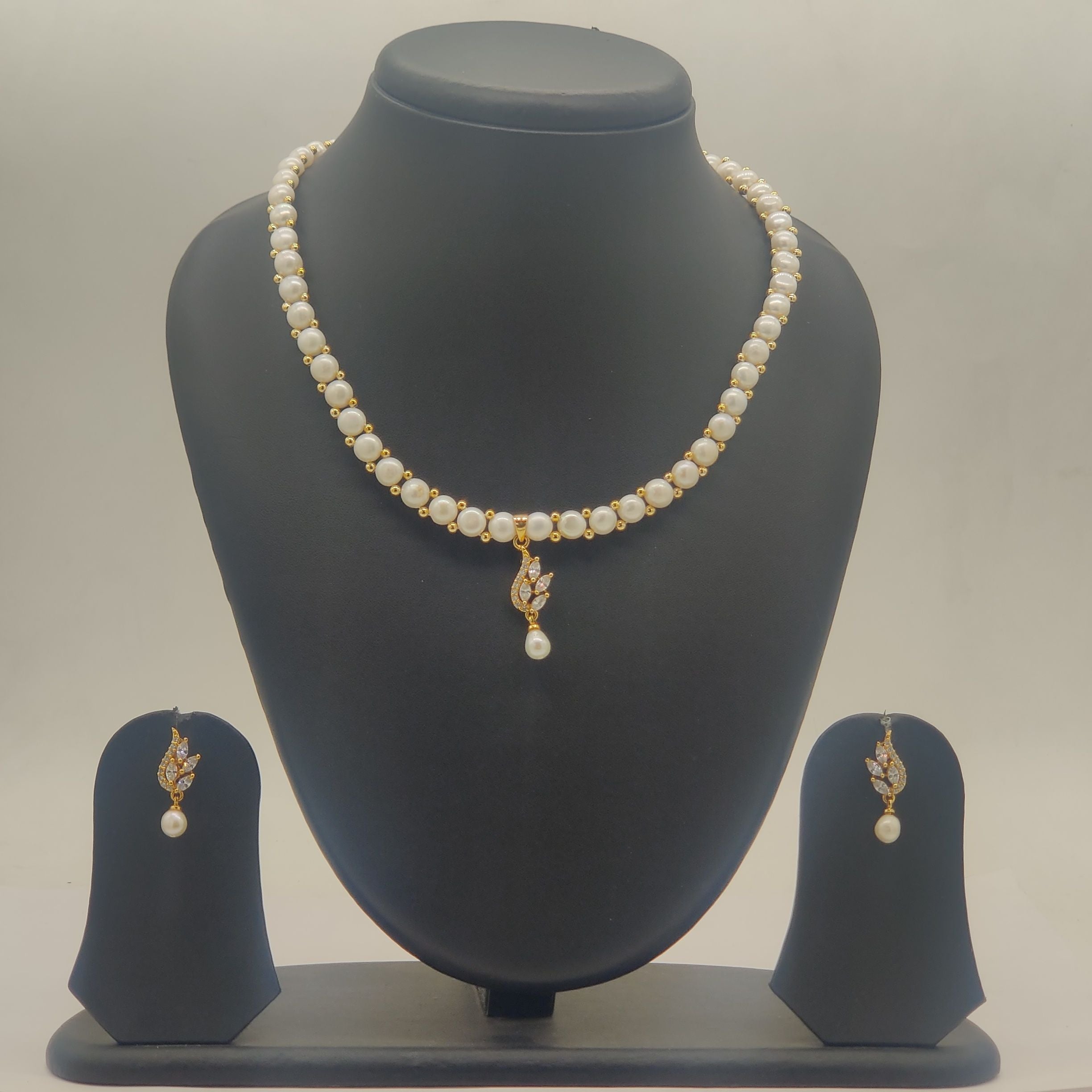 Leaf motif freshwater pearls pendant set with CZ accents and drop earrings for women