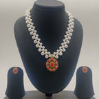 Coral majesty freshwater pearl double-strand pendant set with red coral centerpiece and matching earrings
