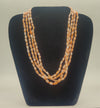 Desert Drape � Intertwined Orange & Ivory Nugget Bead Necklace