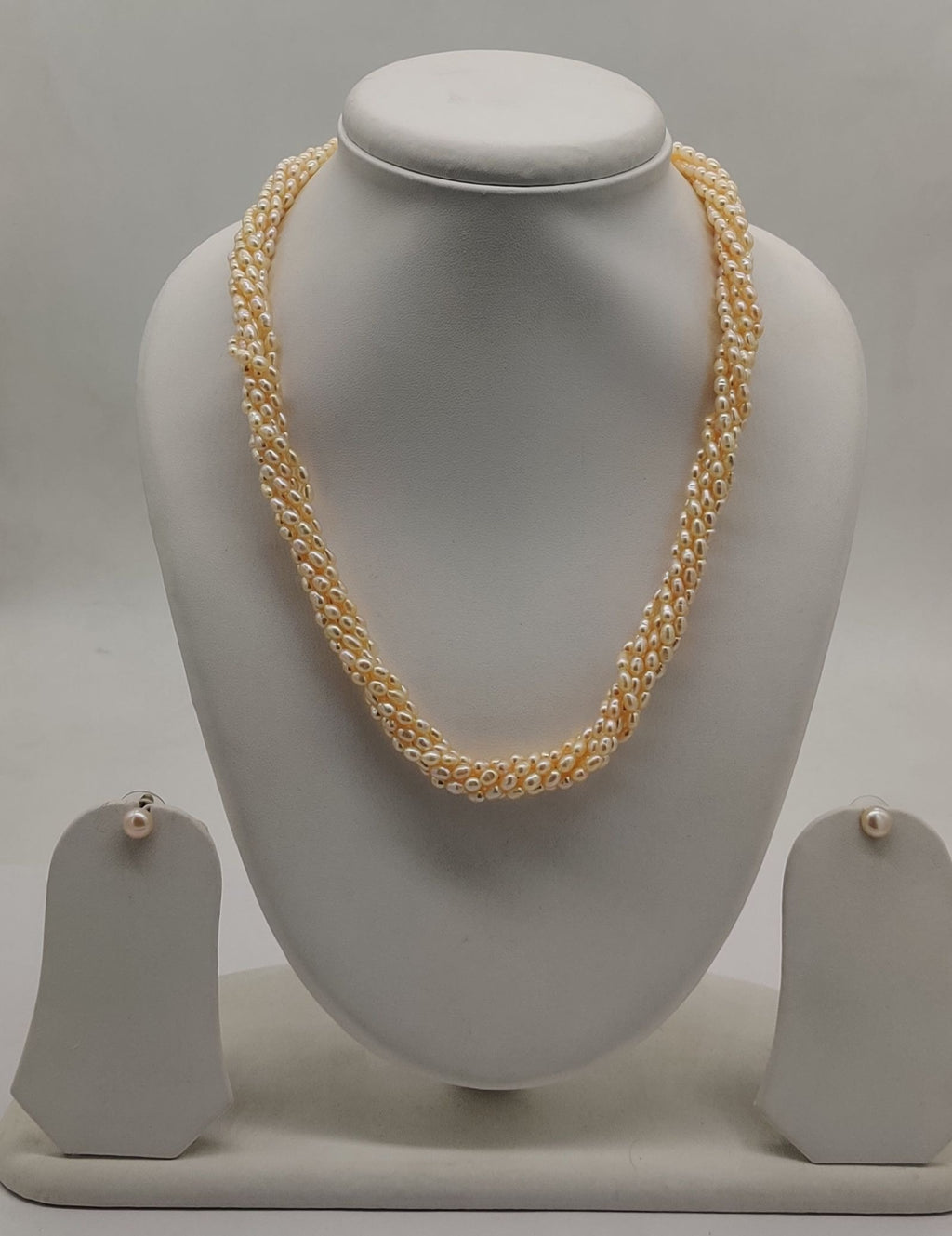 twisted freshwater natural peach rice pearl necklace and earrings set for women in multi-strand twisted design