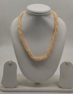 twisted freshwater natural peach rice pearl necklace and earrings set for women in multi-strand twisted design