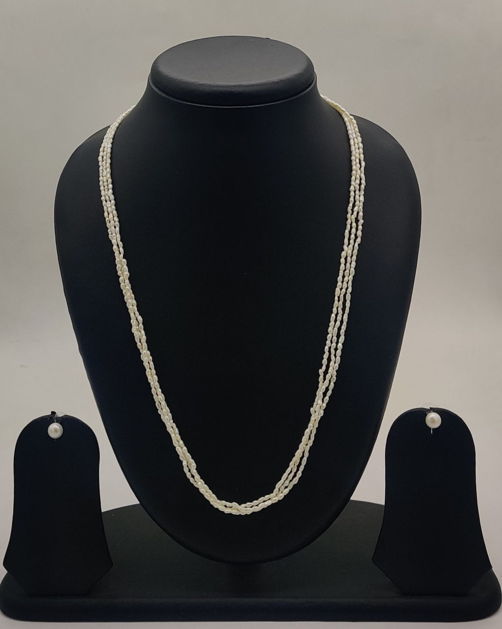 triple-strand freshwater rice pearl necklace and stud earrings set for women in natural off white seed-style pearls