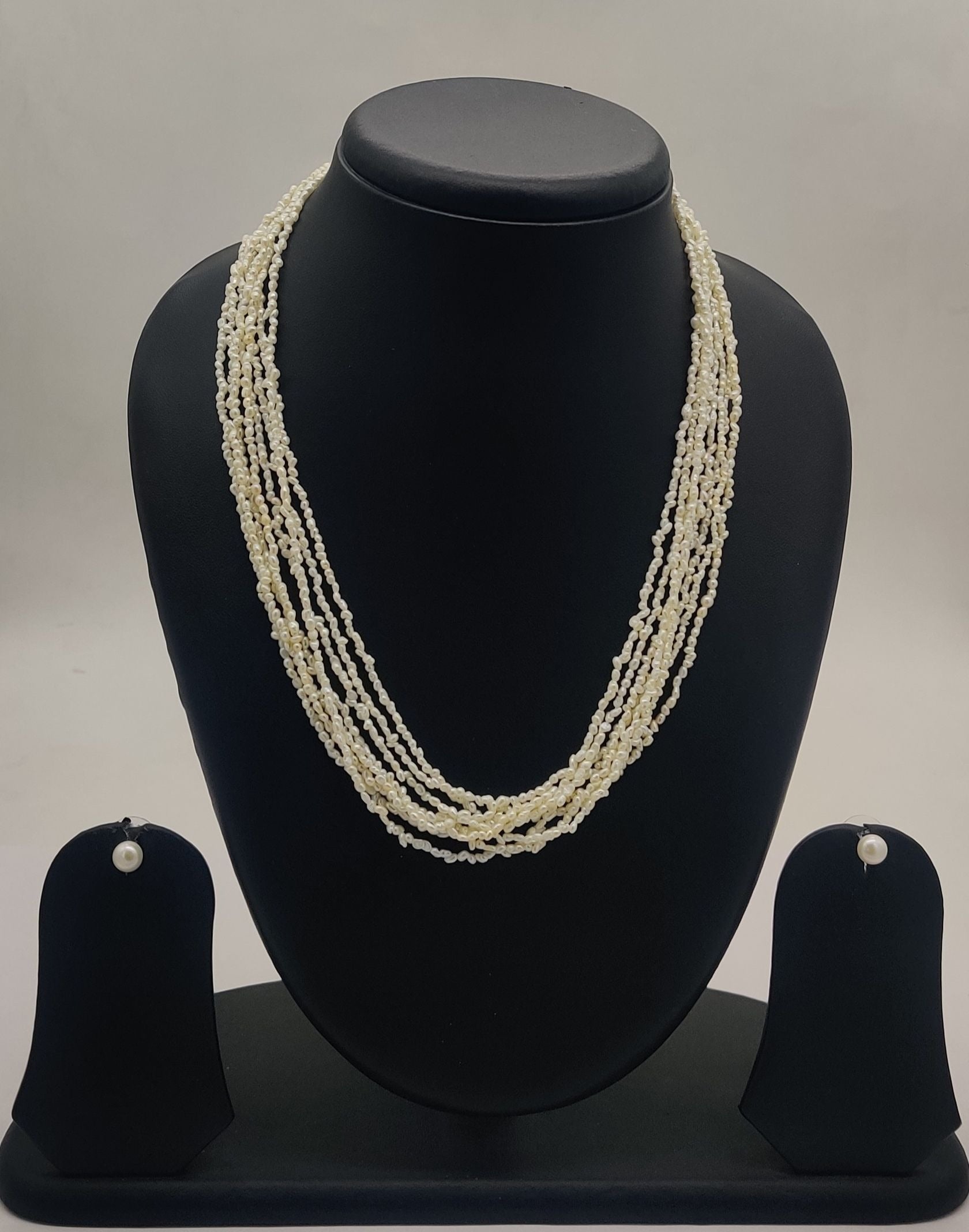 multi-strand twisted freshwater rice pearl necklace and stud earrings set for women in natural off white oval pearls