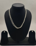 triple-strand freshwater rice pearl necklace and stud earrings set for women in natural off white oval pearls
