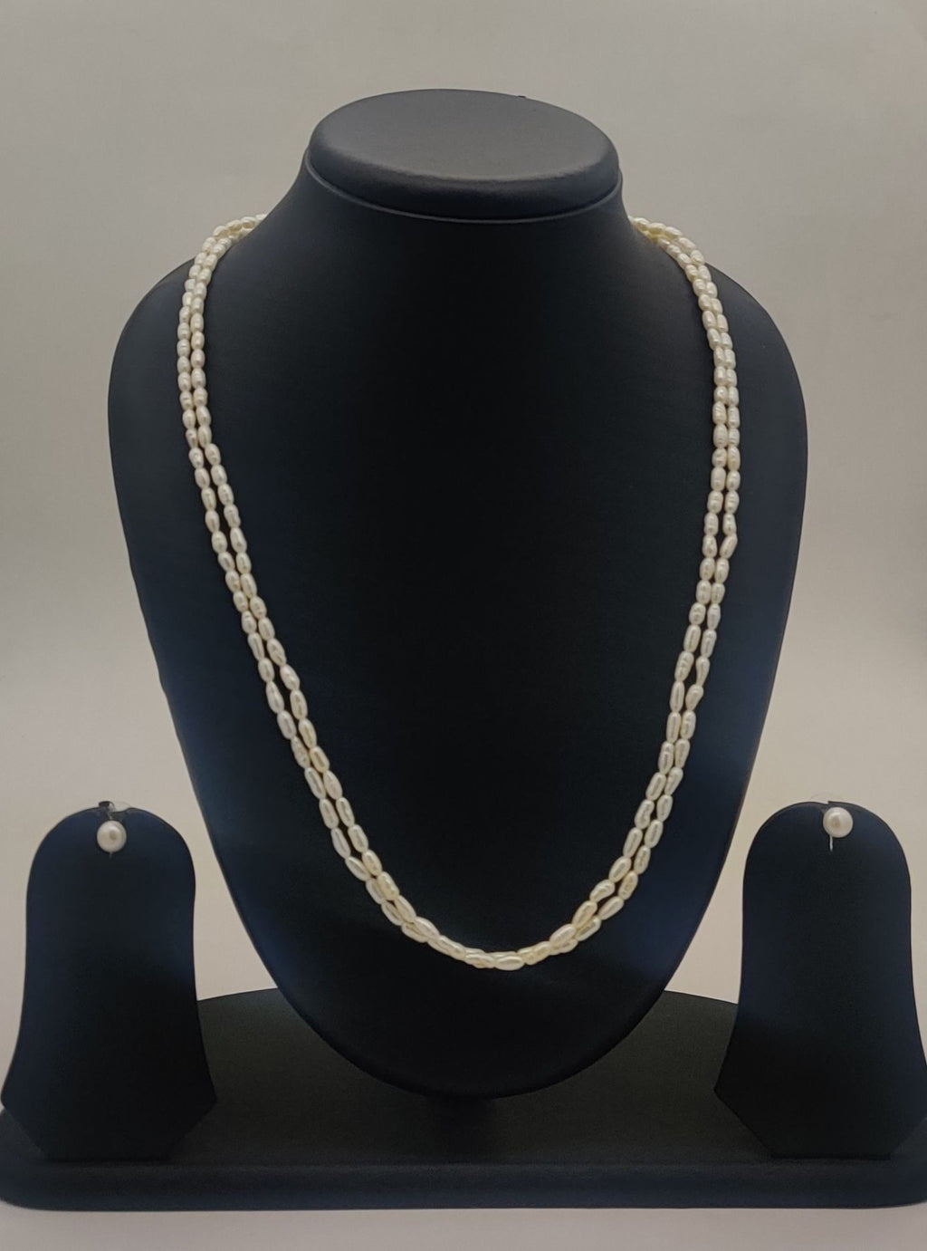 two-strand freshwater rice pearl necklace and stud earrings set for women in natural off white oval pearls