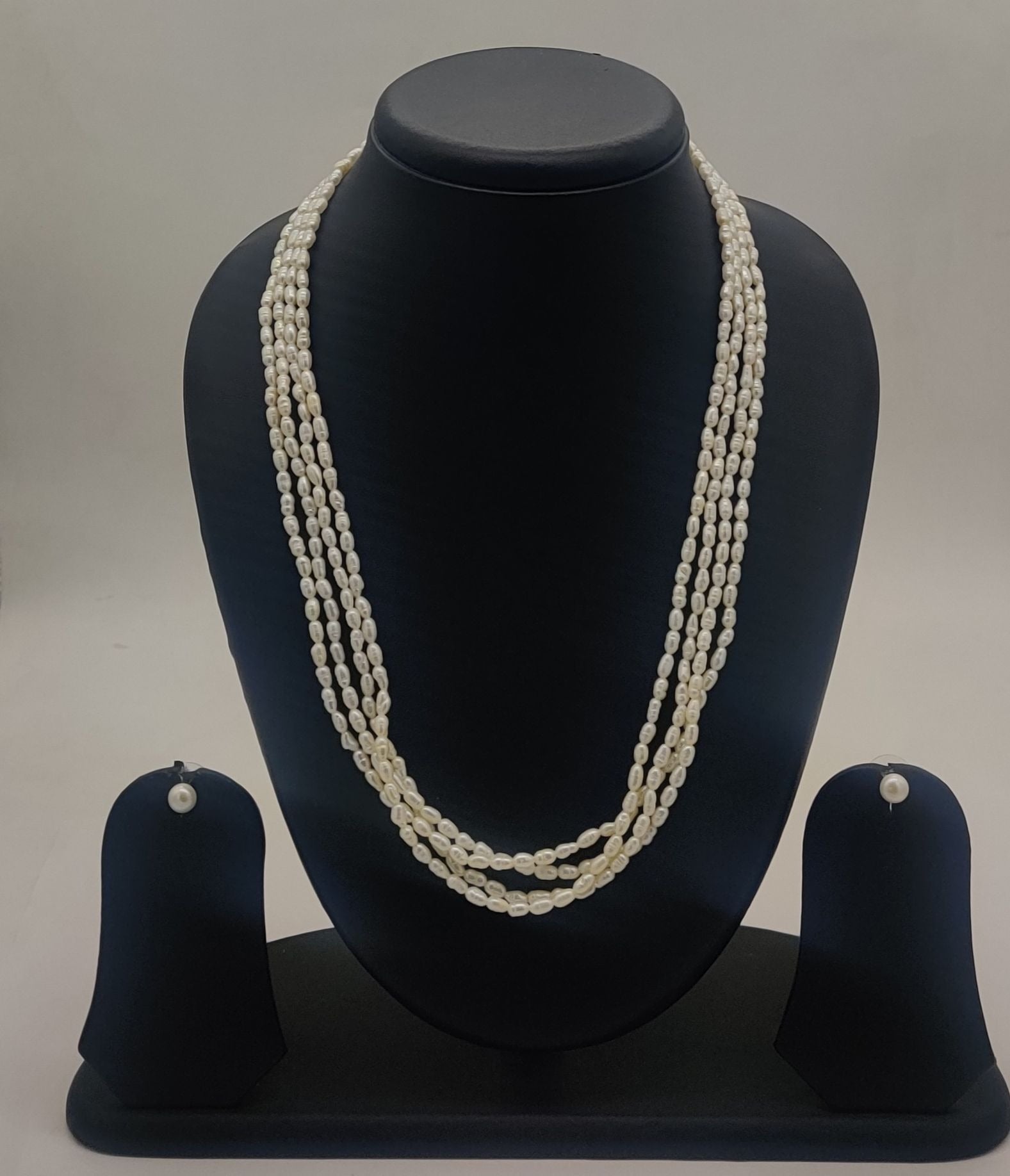 genuine freshwater pearl necklace and earrings set for women crafted with freshwater pearls in four-strand layered design
