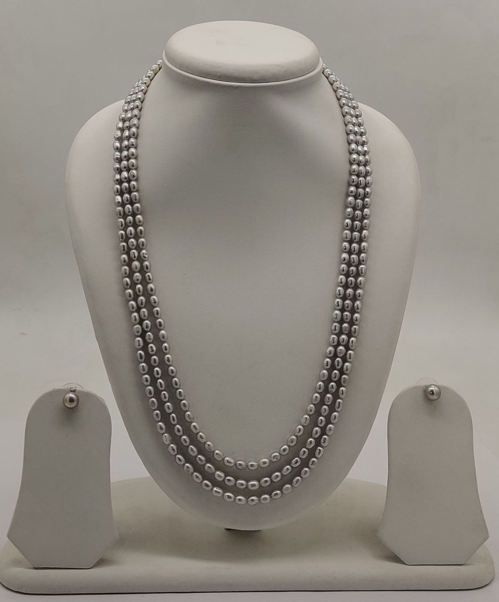 genuine freshwater pearl necklace and earrings set for women crafted with freshwater pearls in triple-strand layered design