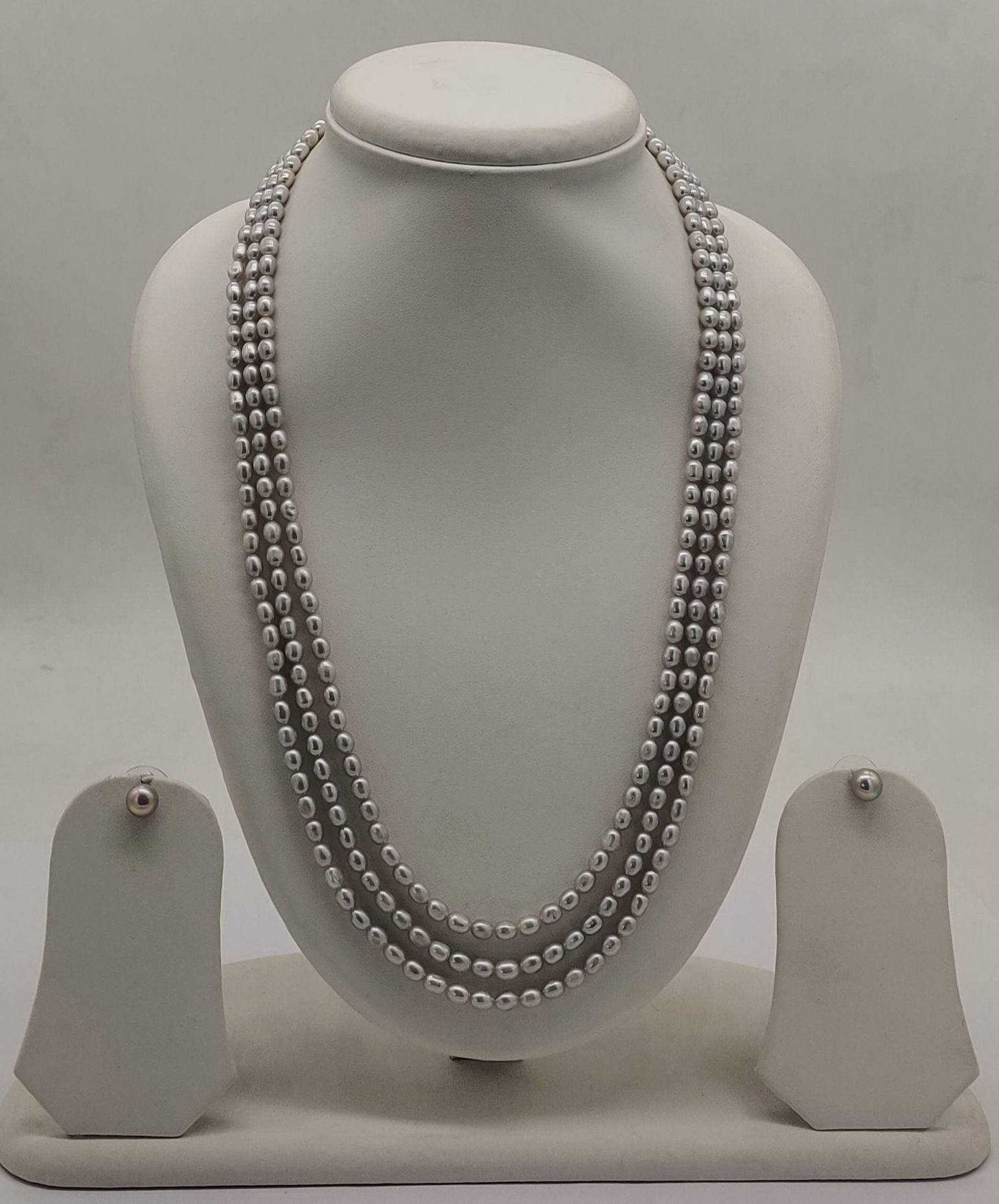 genuine freshwater pearl necklace and earrings set for women crafted with freshwater pearls in triple-strand layered design