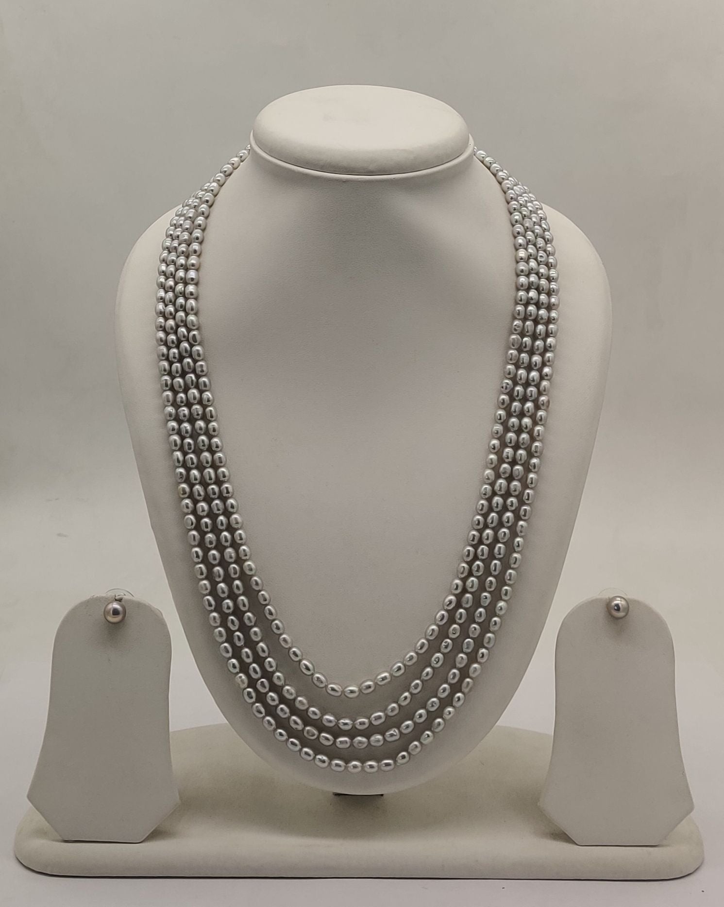 genuine freshwater pearl necklace and earrings set for women crafted with freshwater pearls in four-strand layered design