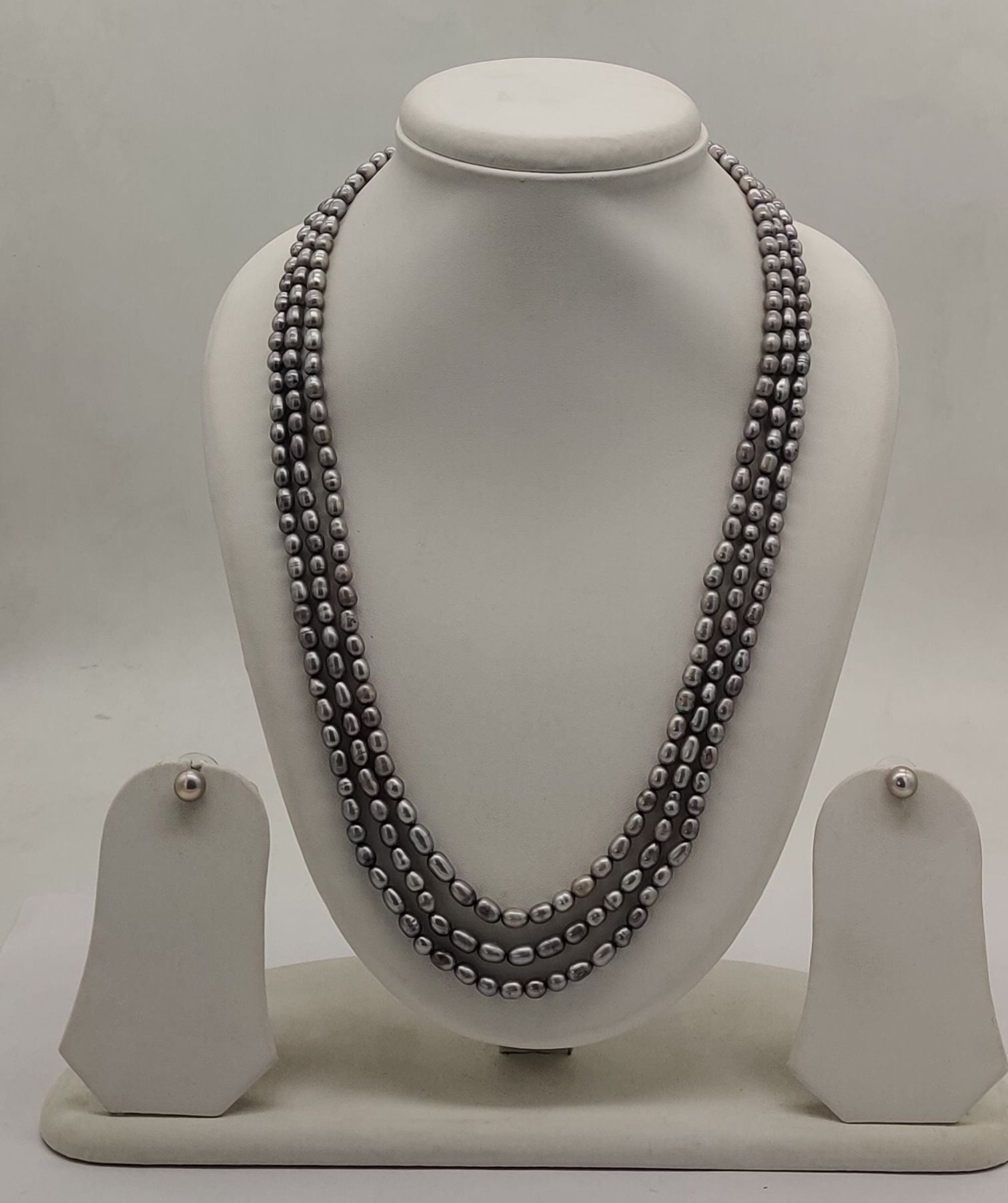 genuine freshwater pearl necklace and earrings set for women crafted with freshwater pearls in triple-strand grey design