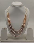 Three-line freshwater pearl necklace and earrings set for women with shaded oval pearls