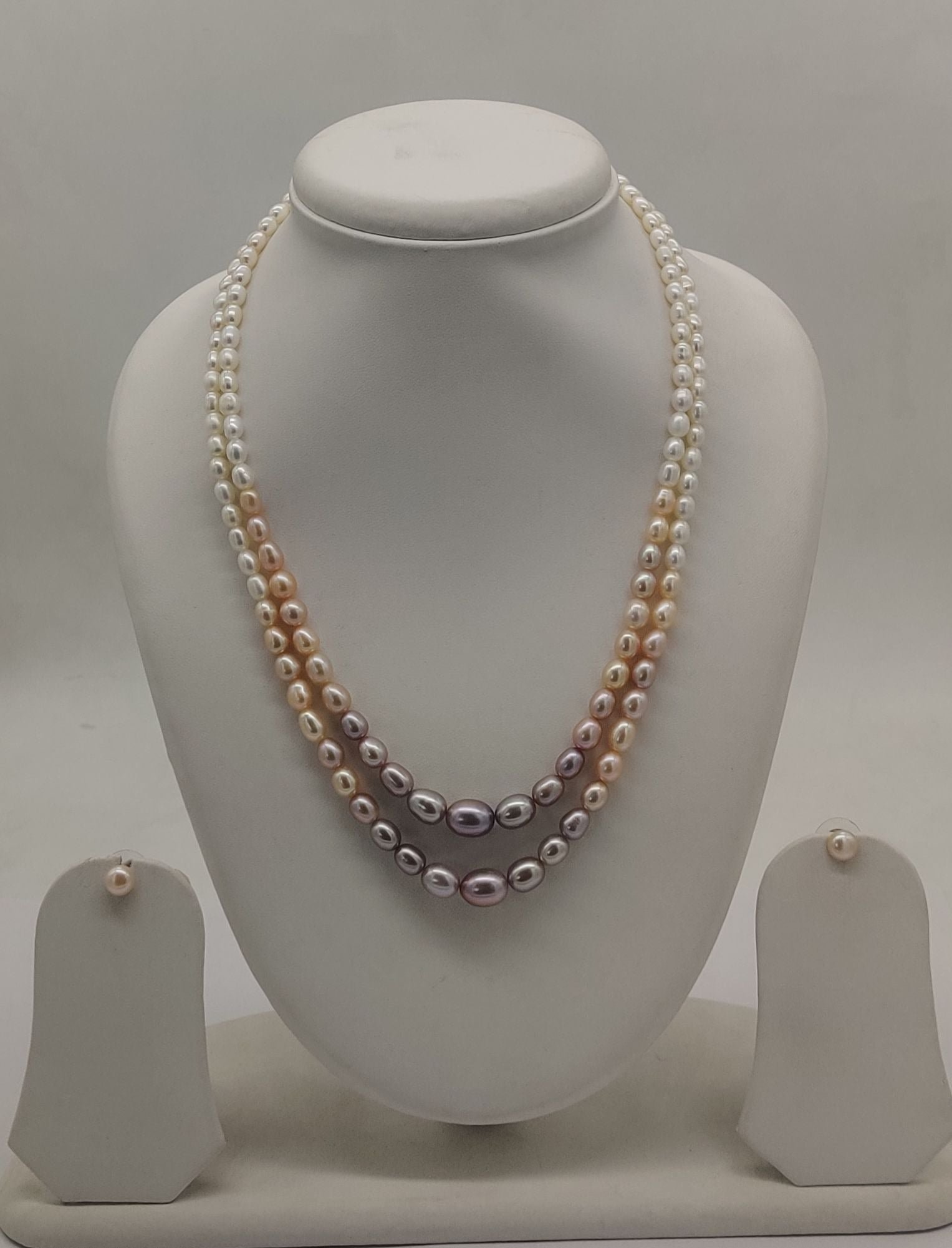 Two-line freshwater pearl necklace and earrings set for women with white to peach gradient pearls