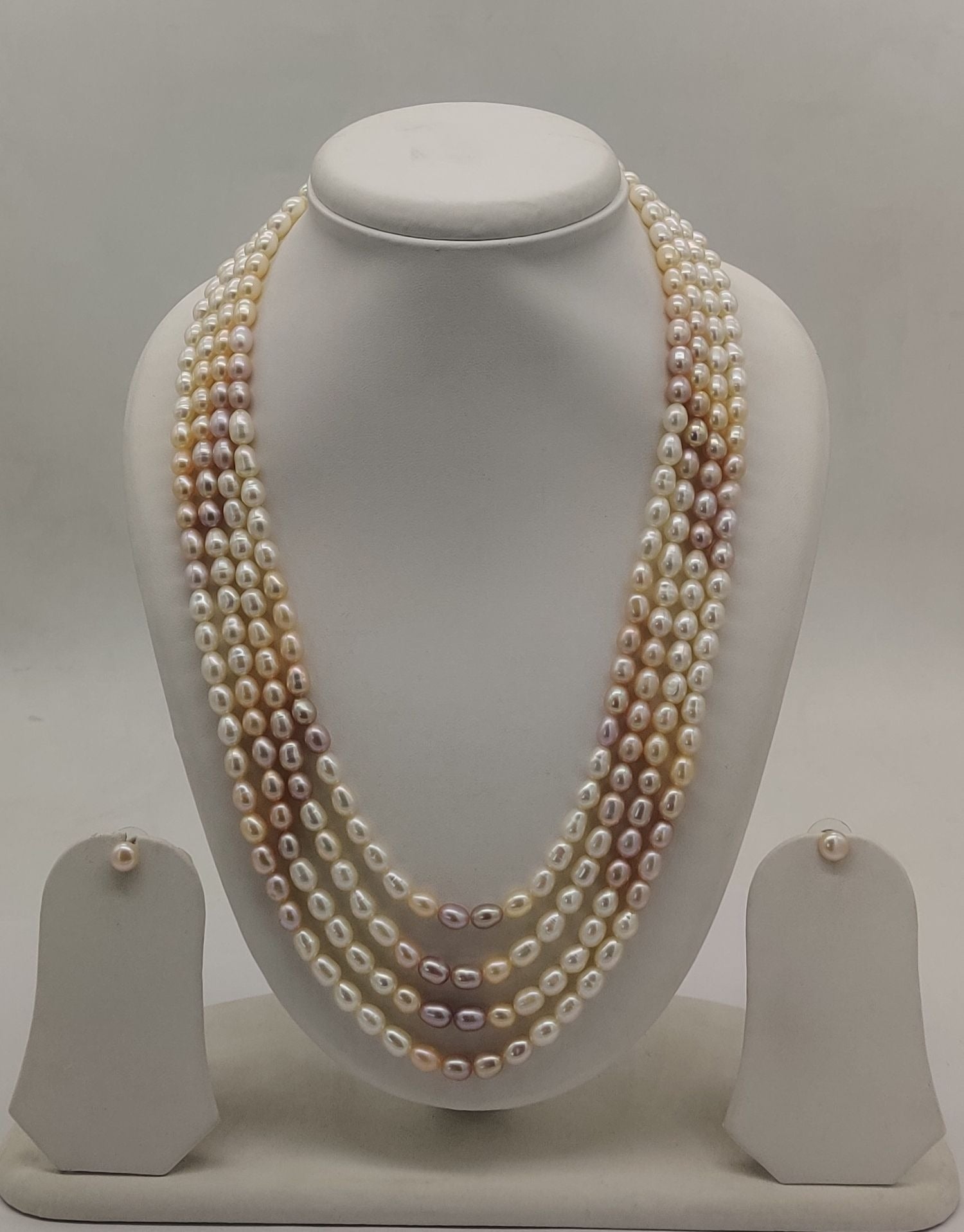 Four-line freshwater pearl necklace and earrings set for women with organic shaped pearls