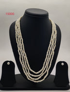 White Four-line freshwater seed pearl necklace and earrings set for women