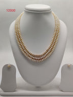 Peach three-line freshwater pearl necklace and earrings set for women