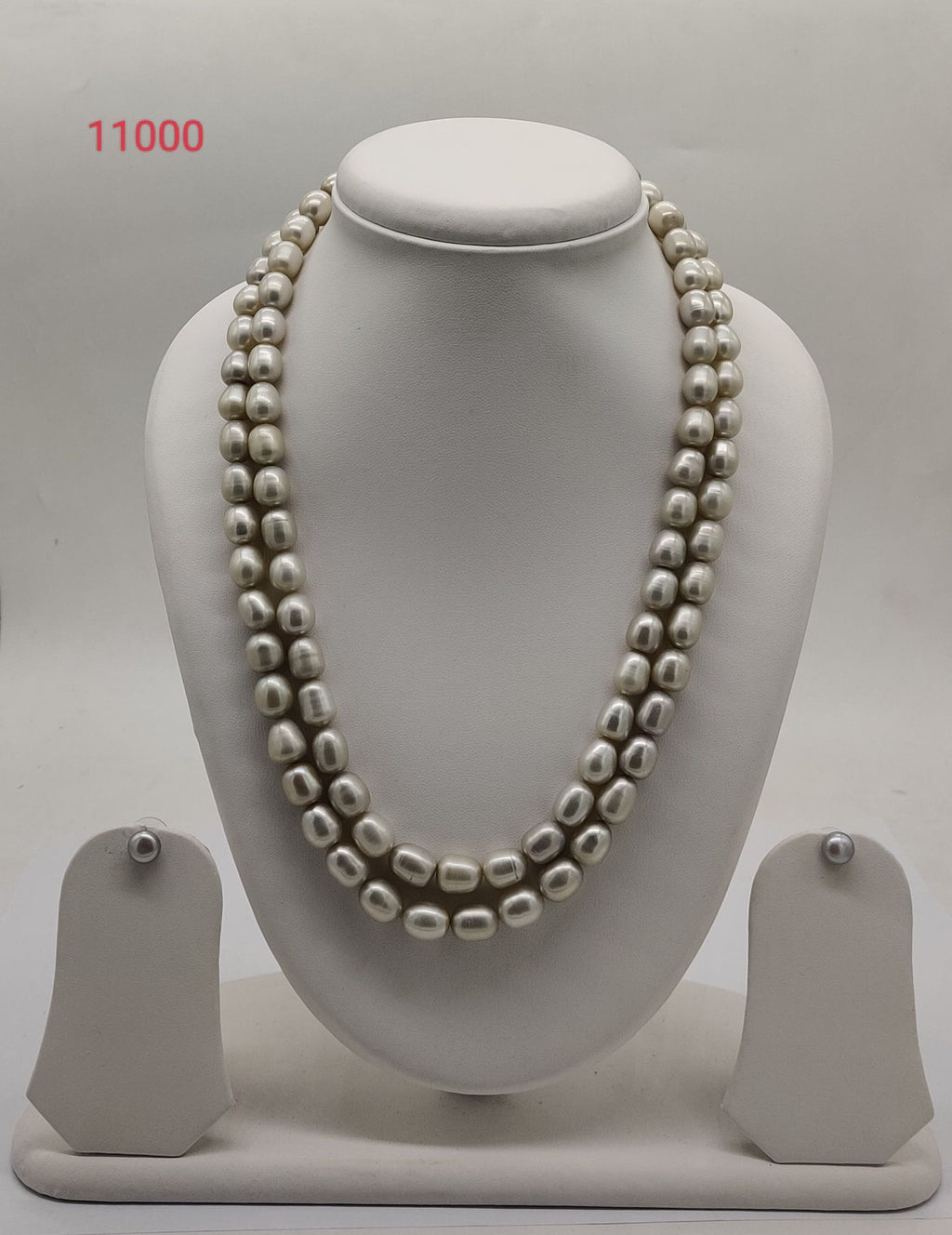 two strand off-white freshwater pearl necklace and earrings set