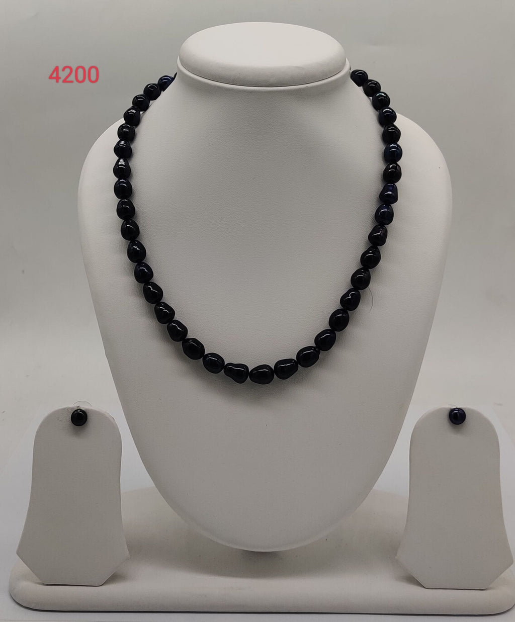 single strand black baroque freshwater pearl necklace and earrings set moonshadow muse oval pearls