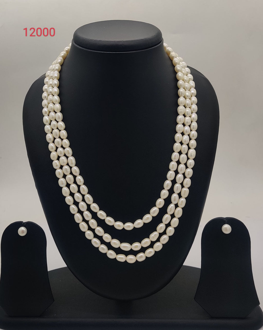 Three-strand freshwater pearl necklace and earrings set for women with oval white pearls