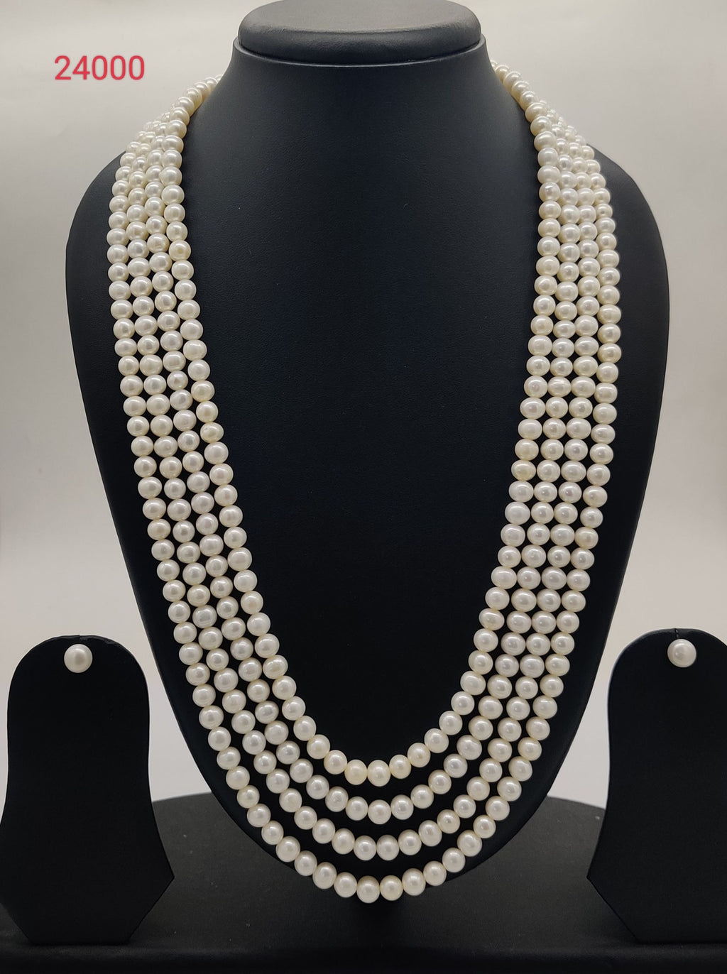 Four-Strand White Freshwater Pearl Necklace Earring Set