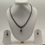 One line freshwater pearl necklace and earrings set with dark grey pearl pendant and matching drop earrings