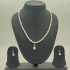 One line freshwater pearl necklace and earrings set with irregular pearls and drop shaped pearl pendant