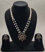 Blue bloom freshwater pearl two-strand pendant set with floral blue and clear stone design and matching earrings
