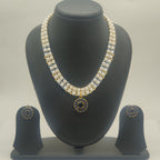 Royal blue multi-strand freshwater pearl necklace set with deep blue circular pendant and matching stud earrings