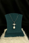 Angelic Heart – Pearl Drop Necklace with Winged Charm