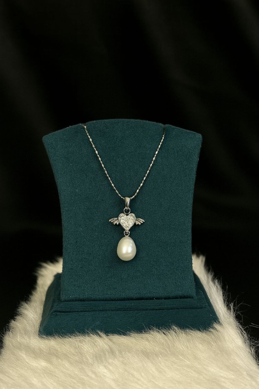 Angelic Heart – Pearl Drop Necklace with Winged Charm